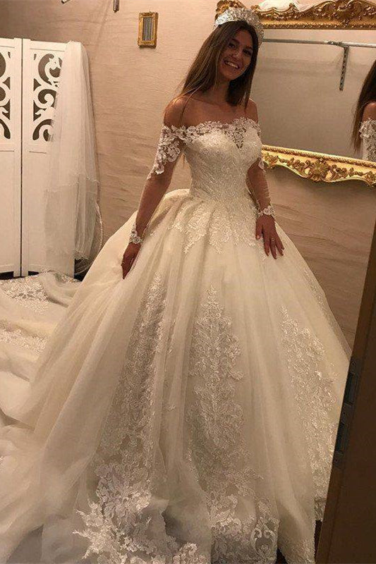 Off-the-Shoulder Ball Gown Wedding Dress With Long Sleeves and Lace Appliques