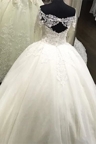 Off-the-Shoulder Ball Gown Wedding Dress With Long Sleeves and Lace Appliques