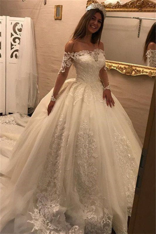 Off-the-Shoulder Ball Gown Wedding Dress With Long Sleeves and Lace Appliques