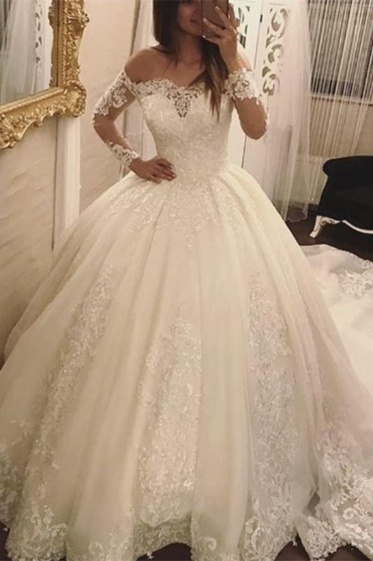 Off-the-Shoulder Ball Gown Wedding Dress With Long Sleeves and Lace Appliques